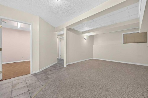 67 Rivercrest Circle Se, Calgary, AB - Indoor Photo Showing Other Room