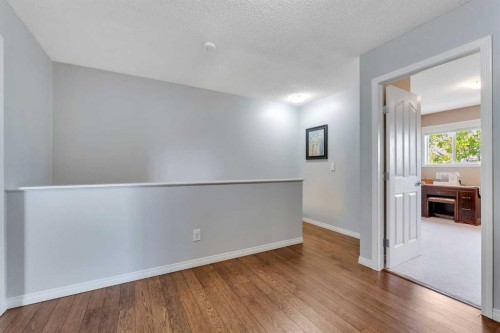 6-156 Canoe Drive Sw, Airdrie, AB - Indoor Photo Showing Other Room