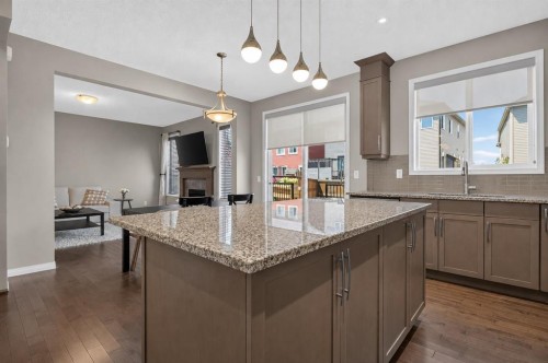 150 Osborne Rise Sw, Airdrie, AB - Indoor Photo Showing Kitchen With Upgraded Kitchen