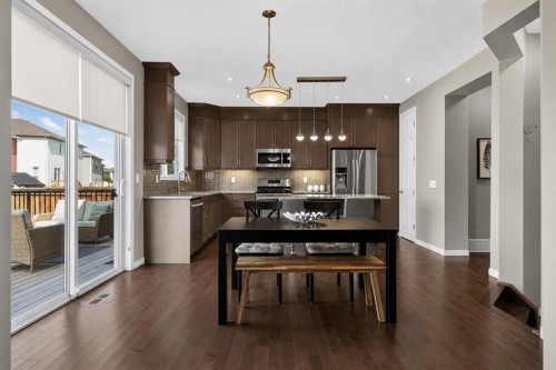 150 Osborne Rise Sw, Airdrie, AB - Indoor Photo Showing Kitchen With Stainless Steel Kitchen With Upgraded Kitchen