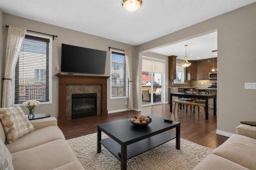 150 Osborne Rise Sw, Airdrie, AB - Indoor Photo Showing Living Room With Fireplace