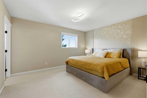 18-15 Silver Springs Way Nw, Airdrie, AB - Indoor Photo Showing Bedroom