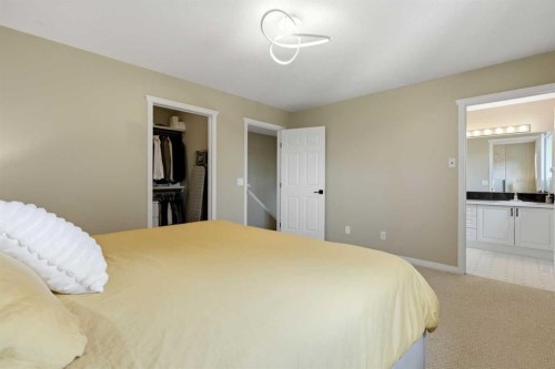 18-15 Silver Springs Way Nw, Airdrie, AB - Indoor Photo Showing Bedroom