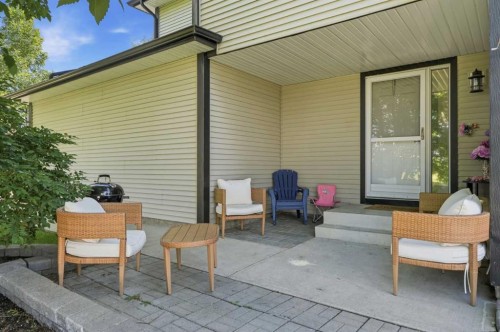 18-15 Silver Springs Way Nw, Airdrie, AB - Outdoor With Deck Patio Veranda With Exterior
