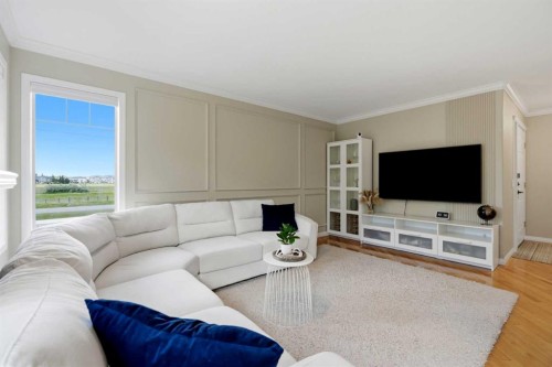 18-15 Silver Springs Way Nw, Airdrie, AB - Indoor Photo Showing Living Room
