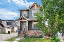 28 Evansborough Gate Nw, Calgary, AB  - Outdoor With Deck Patio Veranda With Facade 
