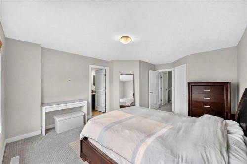 28 Evansborough Gate Nw, Calgary, AB - Indoor Photo Showing Bedroom