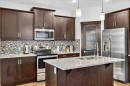 28 Evansborough Gate Nw, Calgary, AB  - Indoor Photo Showing Kitchen With Stainless Steel Kitchen With Double Sink With Upgraded Kitchen 