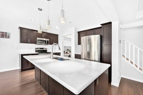 141 Shoreline Vista, Chestermere, AB - Indoor Photo Showing Kitchen With Stainless Steel Kitchen With Double Sink With Upgraded Kitchen