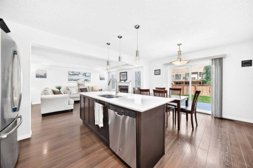 141 Shoreline Vista, Chestermere, AB - Indoor Photo Showing Kitchen With Stainless Steel Kitchen With Double Sink With Upgraded Kitchen