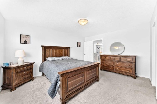 141 Shoreline Vista, Chestermere, AB - Indoor Photo Showing Bedroom