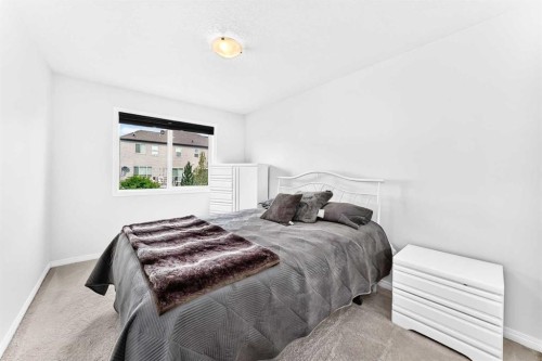 141 Shoreline Vista, Chestermere, AB - Indoor Photo Showing Bedroom