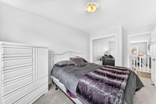 141 Shoreline Vista, Chestermere, AB - Indoor Photo Showing Bedroom