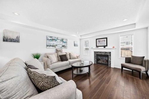 141 Shoreline Vista, Chestermere, AB - Indoor Photo Showing Living Room With Fireplace