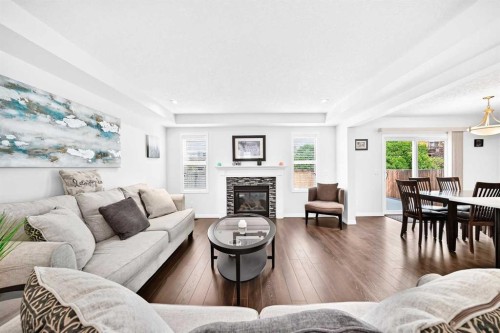 141 Shoreline Vista, Chestermere, AB - Indoor Photo Showing Living Room With Fireplace