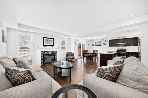 141 Shoreline Vista, Chestermere, AB - Indoor Photo Showing Living Room With Fireplace