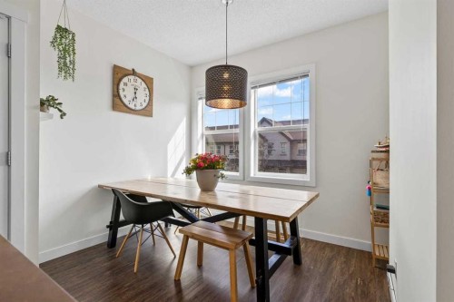 56-28 Heritage Drive, Cochrane, AB - Indoor Photo Showing Dining Room