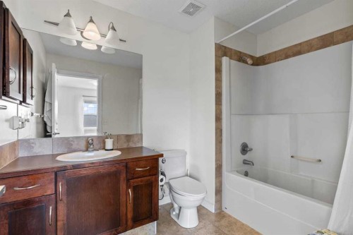 56-28 Heritage Drive, Cochrane, AB - Indoor Photo Showing Bathroom