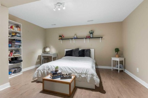 56-28 Heritage Drive, Cochrane, AB - Indoor Photo Showing Bedroom