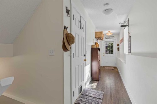 56-28 Heritage Drive, Cochrane, AB - Indoor Photo Showing Other Room