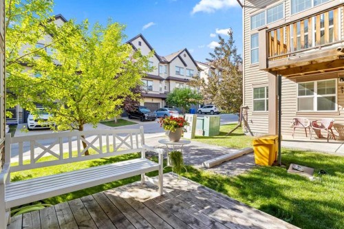 56-28 Heritage Drive, Cochrane, AB - Outdoor With Deck Patio Veranda