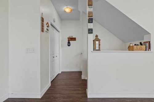 56-28 Heritage Drive, Cochrane, AB - Indoor Photo Showing Other Room