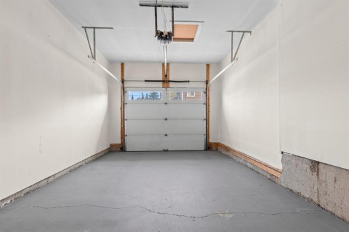 790 River Heights Crescent, Cochrane, AB - Indoor Photo Showing Garage