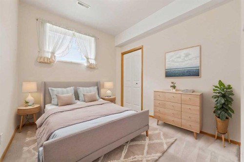 16 Arbour Estates View Nw, Calgary, AB - Indoor Photo Showing Bedroom