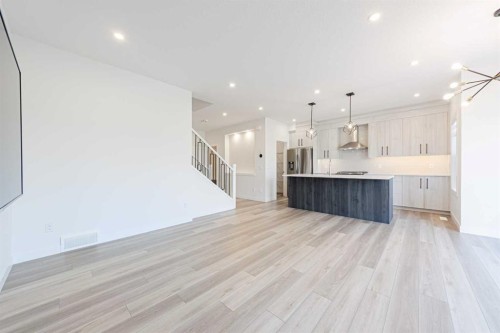 293 Carringsby Way Nw, Calgary, AB - Indoor Photo Showing Kitchen With Upgraded Kitchen