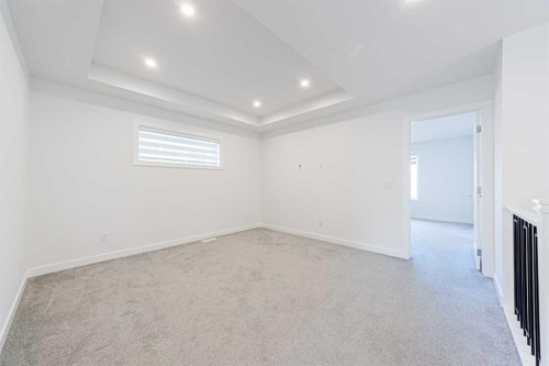293 Carringsby Way Nw, Calgary, AB - Indoor Photo Showing Other Room