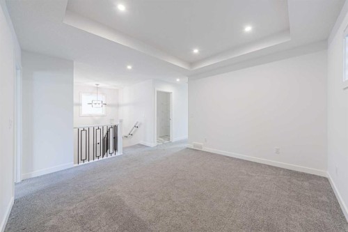 293 Carringsby Way Nw, Calgary, AB - Indoor Photo Showing Other Room