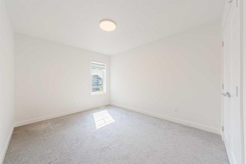 293 Carringsby Way Nw, Calgary, AB - Indoor Photo Showing Other Room