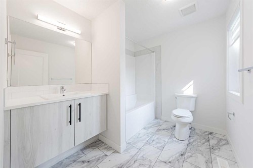 293 Carringsby Way Nw, Calgary, AB - Indoor Photo Showing Bathroom