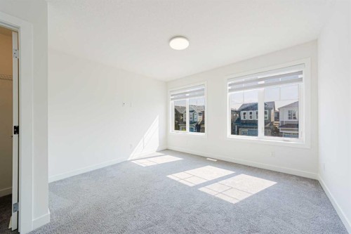293 Carringsby Way Nw, Calgary, AB - Indoor Photo Showing Other Room