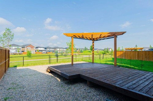 293 Carringsby Way Nw, Calgary, AB - Outdoor With Deck Patio Veranda