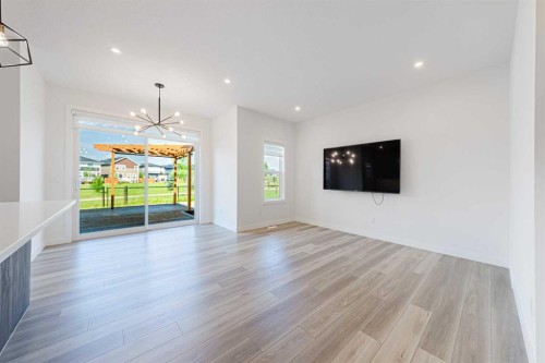 293 Carringsby Way Nw, Calgary, AB - Indoor Photo Showing Living Room