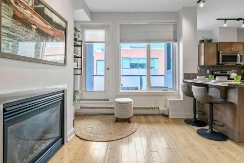 507-328 21 Avenue Sw, Calgary, AB - Indoor With Fireplace