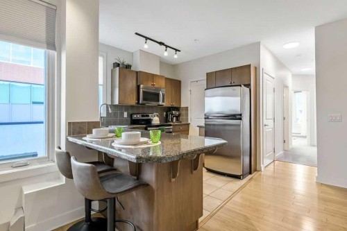 507-328 21 Avenue Sw, Calgary, AB - Indoor Photo Showing Kitchen With Stainless Steel Kitchen