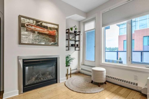 507-328 21 Avenue Sw, Calgary, AB - Indoor Photo Showing Living Room With Fireplace