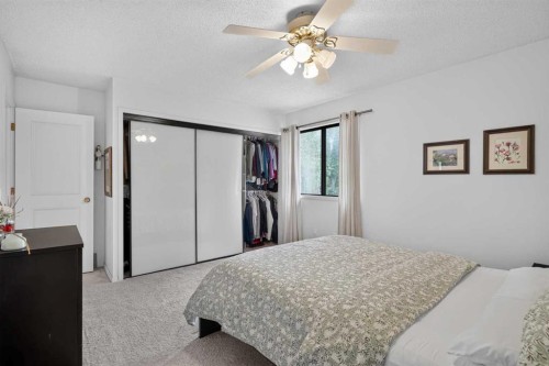 80 Hawkhill Way Nw, Calgary, AB - Indoor Photo Showing Bedroom
