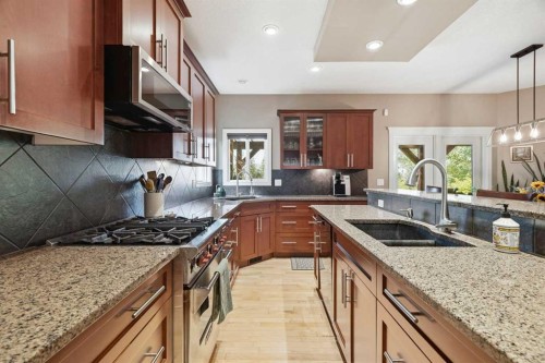 68 Drake Landing Way, Okotoks, AB - Indoor Photo Showing Kitchen With Double Sink With Upgraded Kitchen