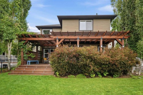 68 Drake Landing Way, Okotoks, AB - Outdoor With Deck Patio Veranda