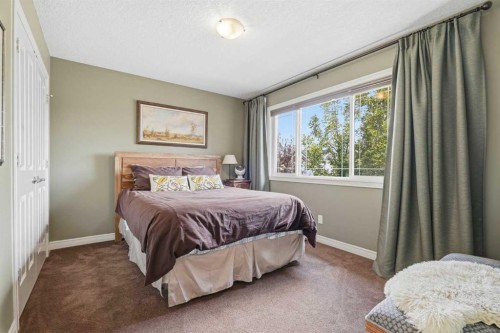 68 Drake Landing Way, Okotoks, AB - Indoor Photo Showing Bedroom