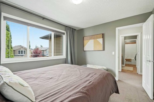 68 Drake Landing Way, Okotoks, AB - Indoor Photo Showing Bedroom