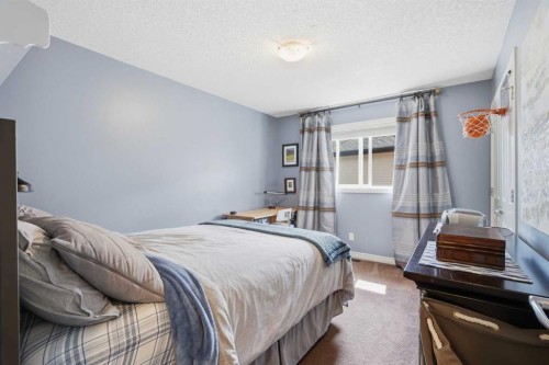 68 Drake Landing Way, Okotoks, AB - Indoor Photo Showing Bedroom
