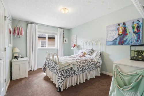 68 Drake Landing Way, Okotoks, AB - Indoor Photo Showing Bedroom