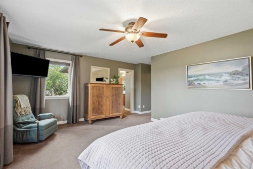 68 Drake Landing Way, Okotoks, AB - Indoor Photo Showing Bedroom