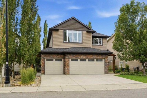 68 Drake Landing Way, Okotoks, AB - Outdoor With Facade