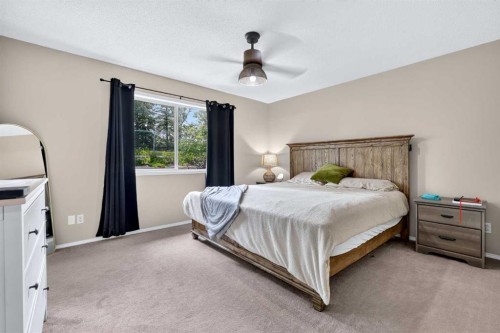 261 Panamount Hill Nw, Calgary, AB - Indoor Photo Showing Bedroom