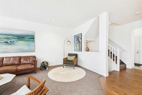 25 Evansglen Mews Nw, Calgary, AB - Indoor Photo Showing Living Room